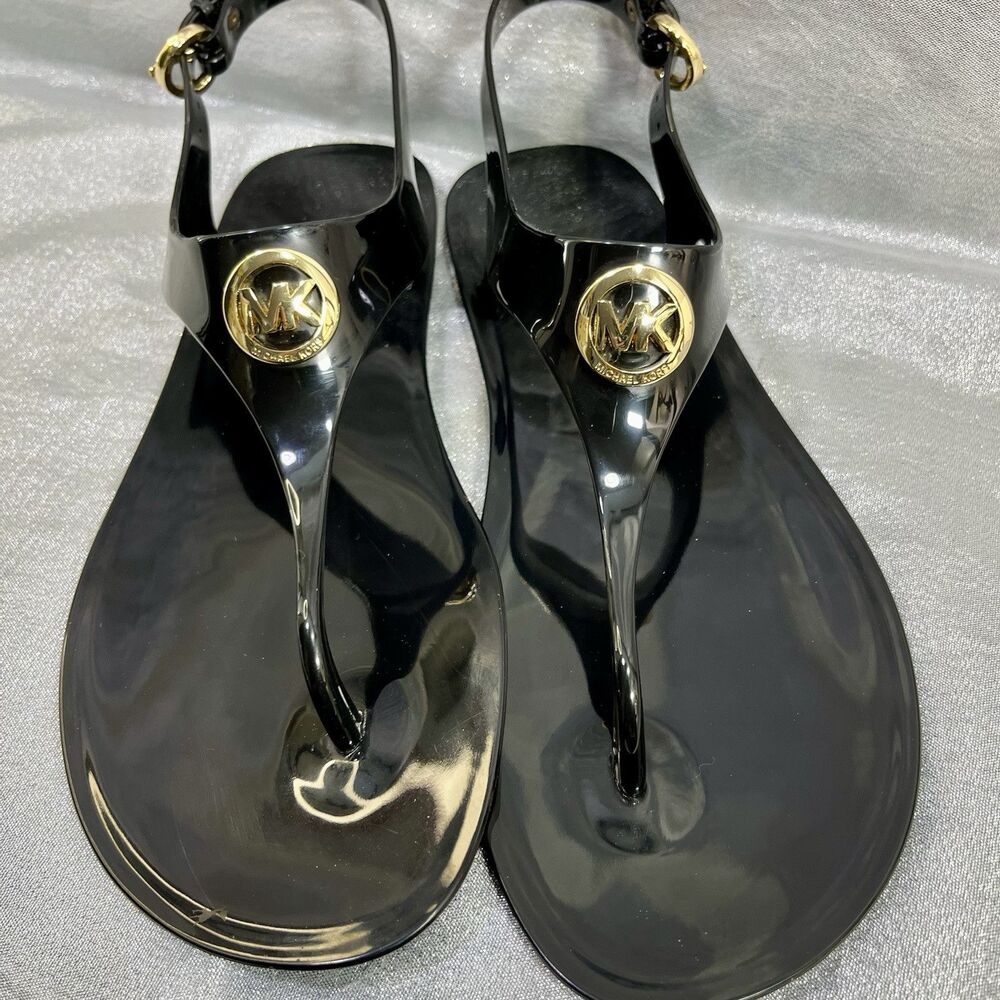 Michael Kors Mira Black Jelly Thong Sandals with Gold Lock Accent Women’s Size 9